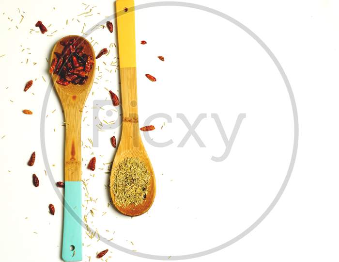 Top View Of Wooden Spoons On White Background With Spices And Chili Peppers. Gastronomy Menu Concept. Flat Lay