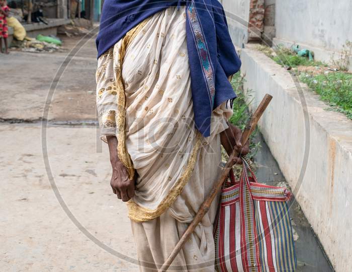 Portrait Of A Poor And Old Woman Of India From The Tribal Community