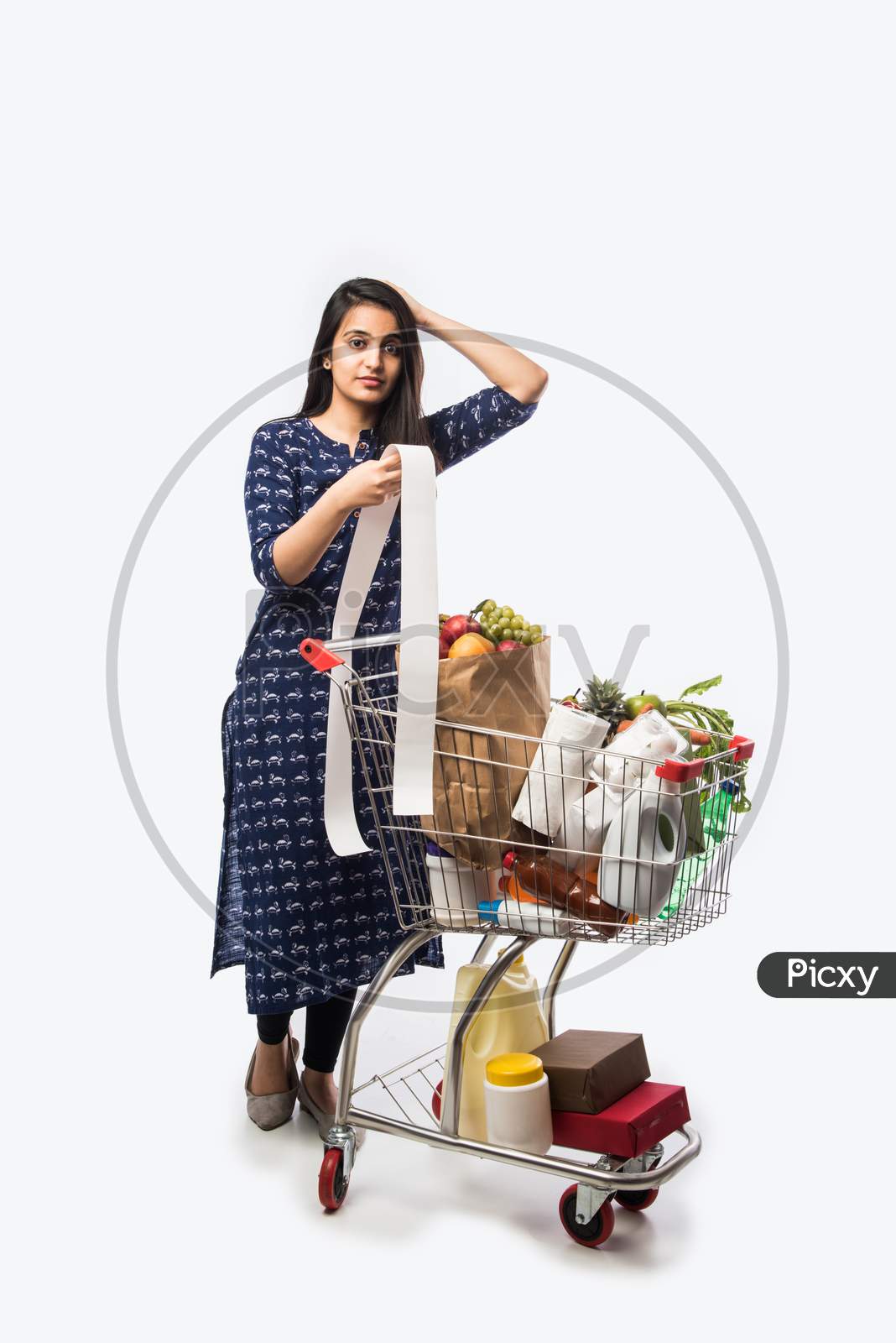 Indian woman or girl with shopping cart
