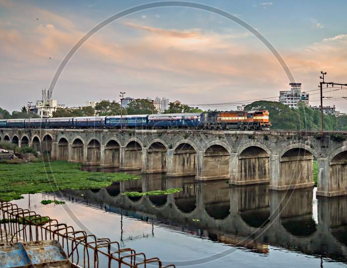 Train Passing Over An Old Bridge Named Sangam Bridge, Pune, Maharashtra.