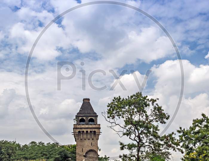 Nice Clouds And Blue Sky Over Ancient Dome Of College Of Engineering Pune.
