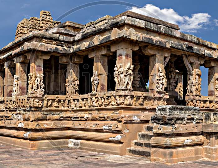 Entrance Of Durga Temple With Blue Sky And Clouds, Aihole, Karnataka, India.