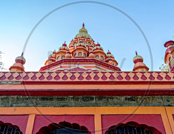 Close Up Of Dome Of Parvati Temple On A Clear Blue Sky Background.