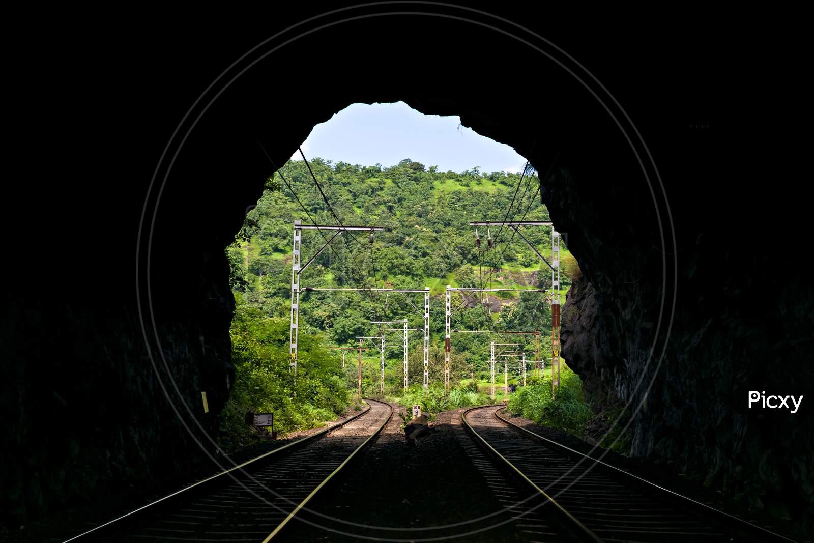 View Through A Railway Tunnel With Two Diverging Routes Ahead.