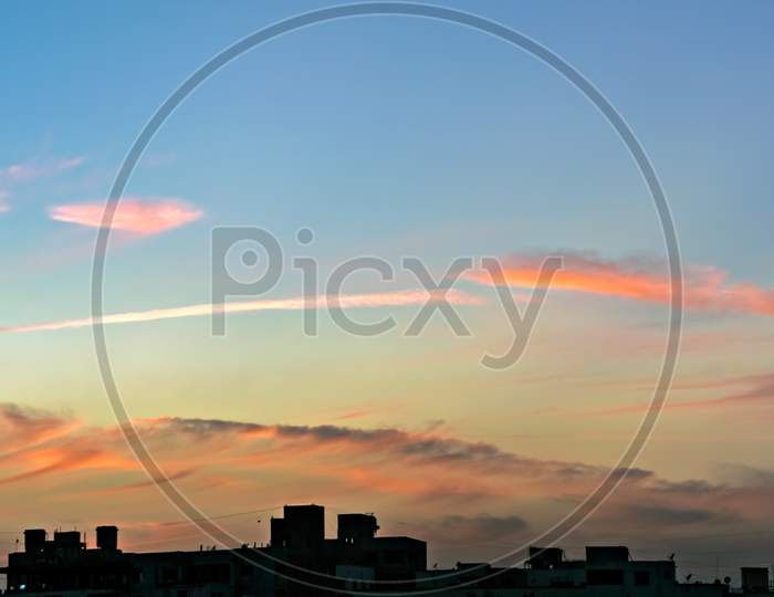 Panorama Image Of Beautiful Evening Sky In The City.Light Of Evening Sky Colors.