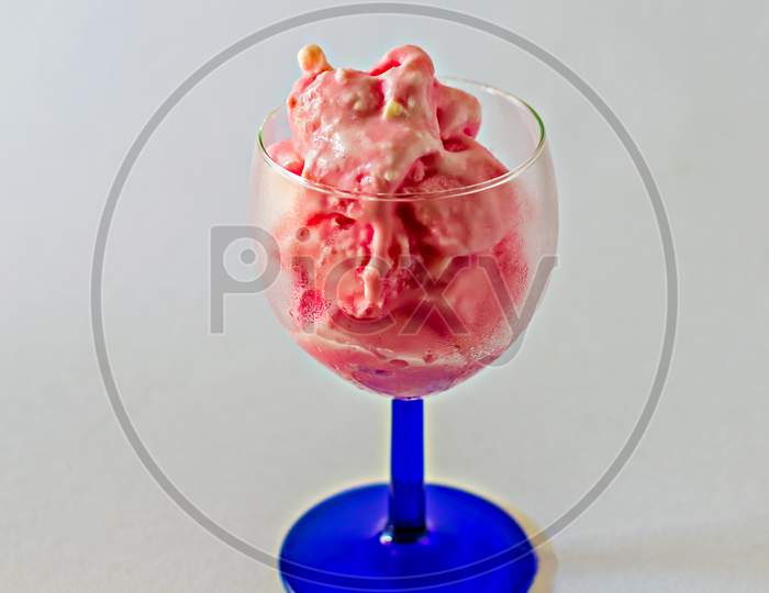 Delicious, Pink Strawberry Ice-Cream In A Transparent Wine Glass.