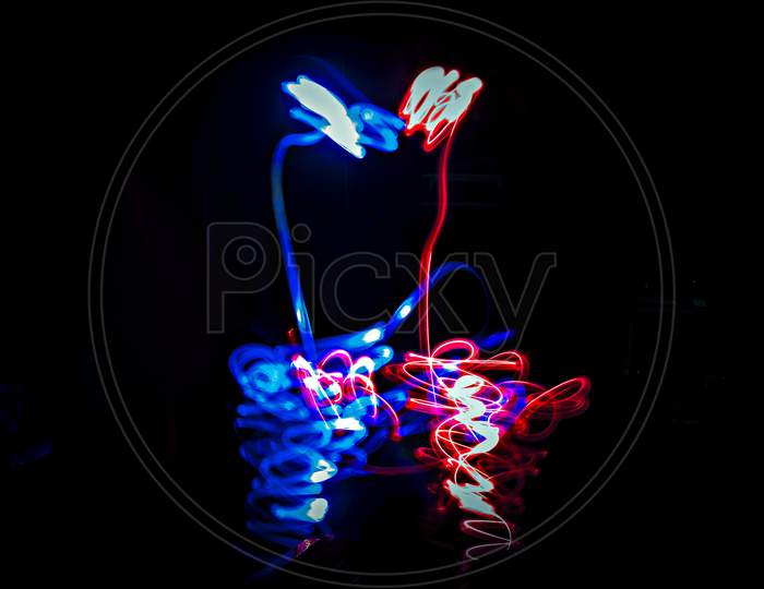 Photograph Of Abstract Light Painting Art Indicating Love.