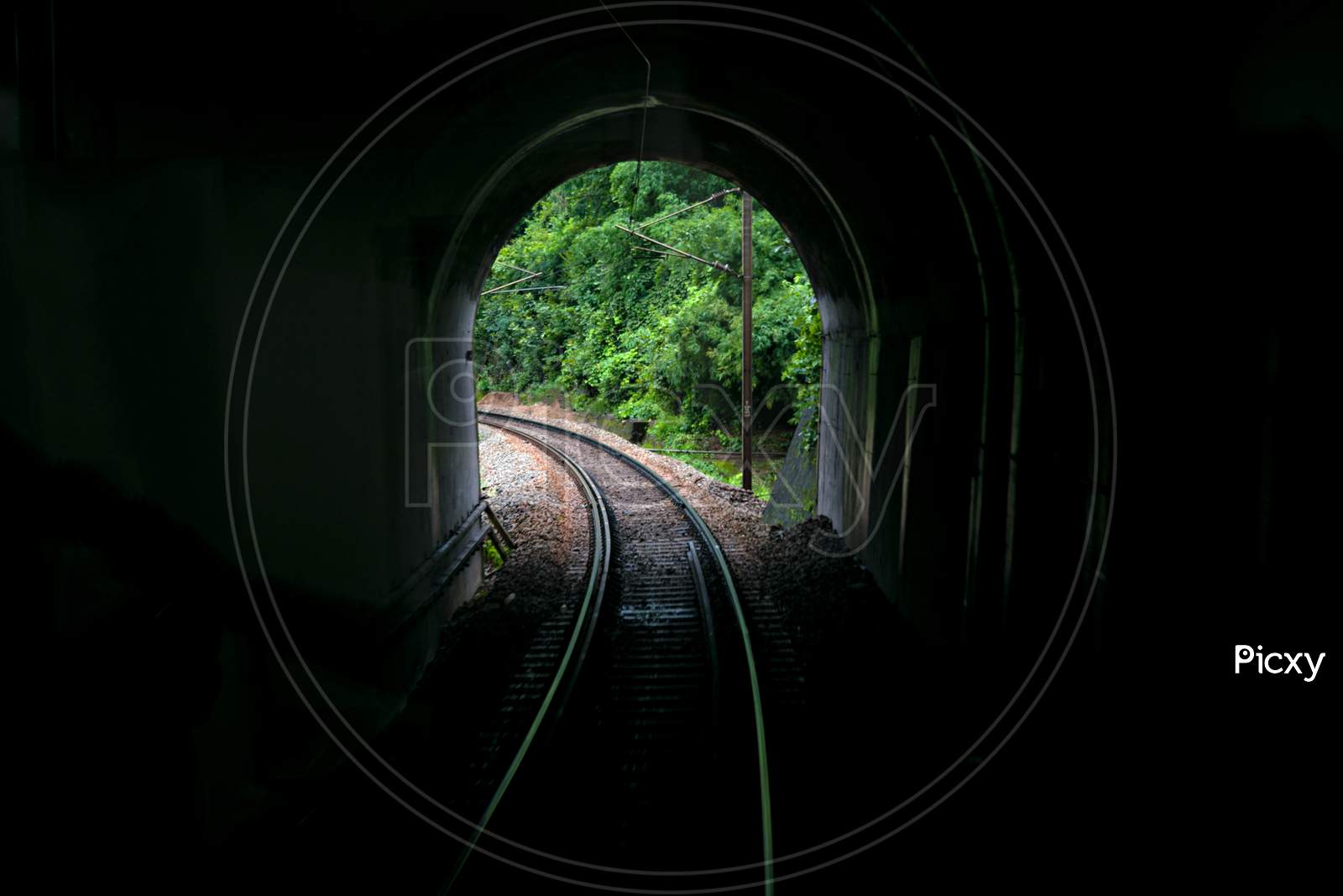 Image Taken From Vista-Dome Tourist Coach Of A Tunnel Portal With Railway Line.