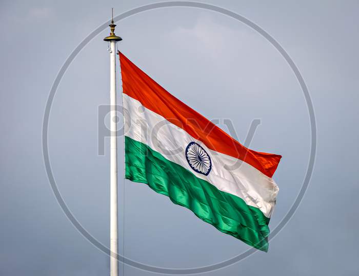 National Flag Of Country India, Unfurled And Flying In The Air On A Clear Background.