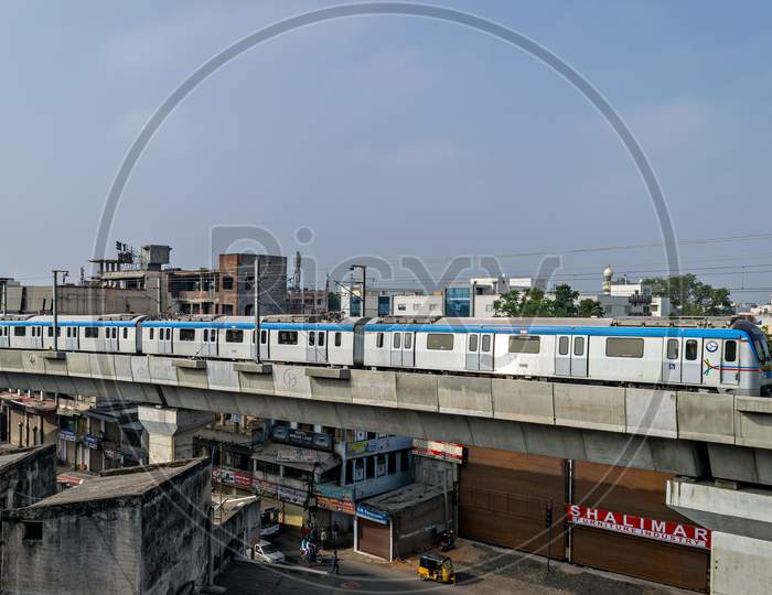 Rapid Transit Hyderabad Metro Train Enter Nampally Station In The Morning.