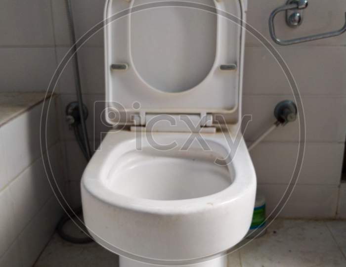 Close Up Shot Of Open Toilet Seat