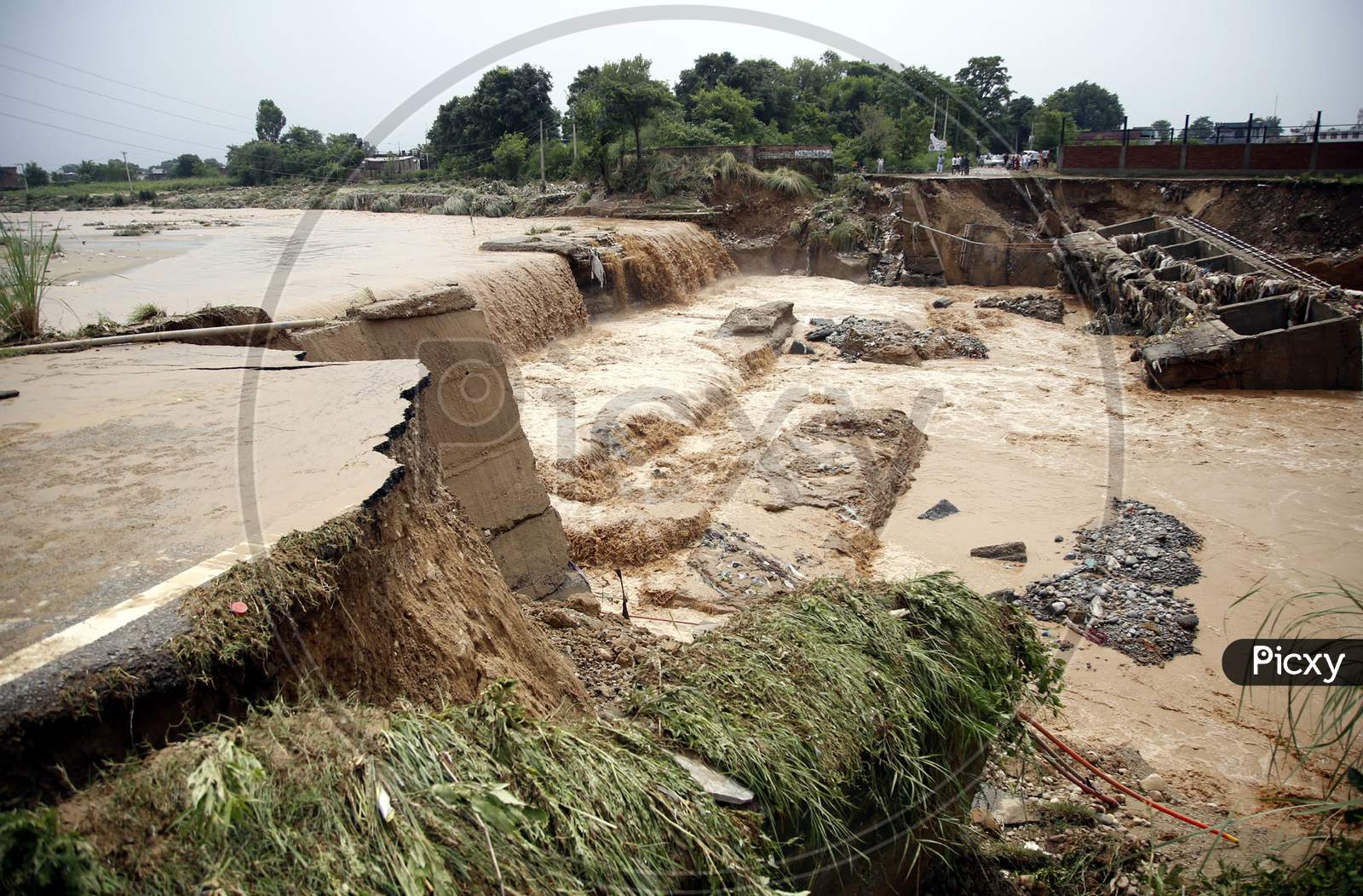 Destroyed bridge over a stream after a heavy rains in the outskirts of Jammu,  26 August 2020.