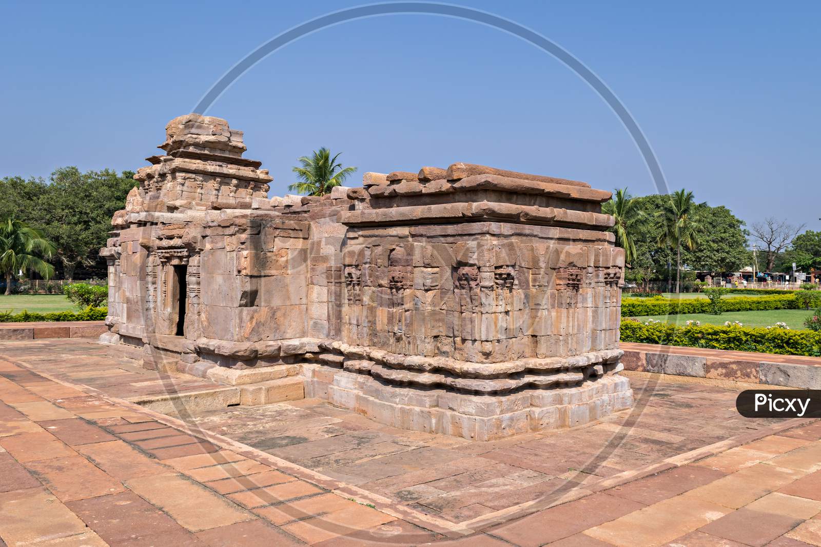 Ancient 8Th Century Carved Stone Temple With Beautiful Blue Sky At Aihole,India.