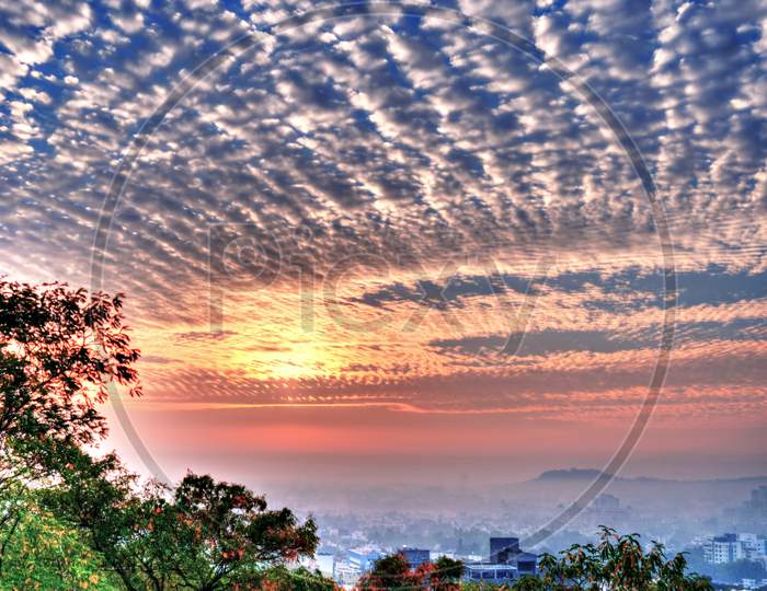 View Of Sunrise In Pune With Some Nice Cloud Pattern And Dramatic Colors.