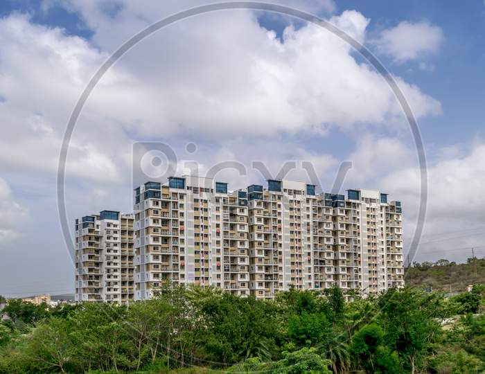 High-Rise Building With Beautiful Clouds Background In A Fast Developing City-Pune.