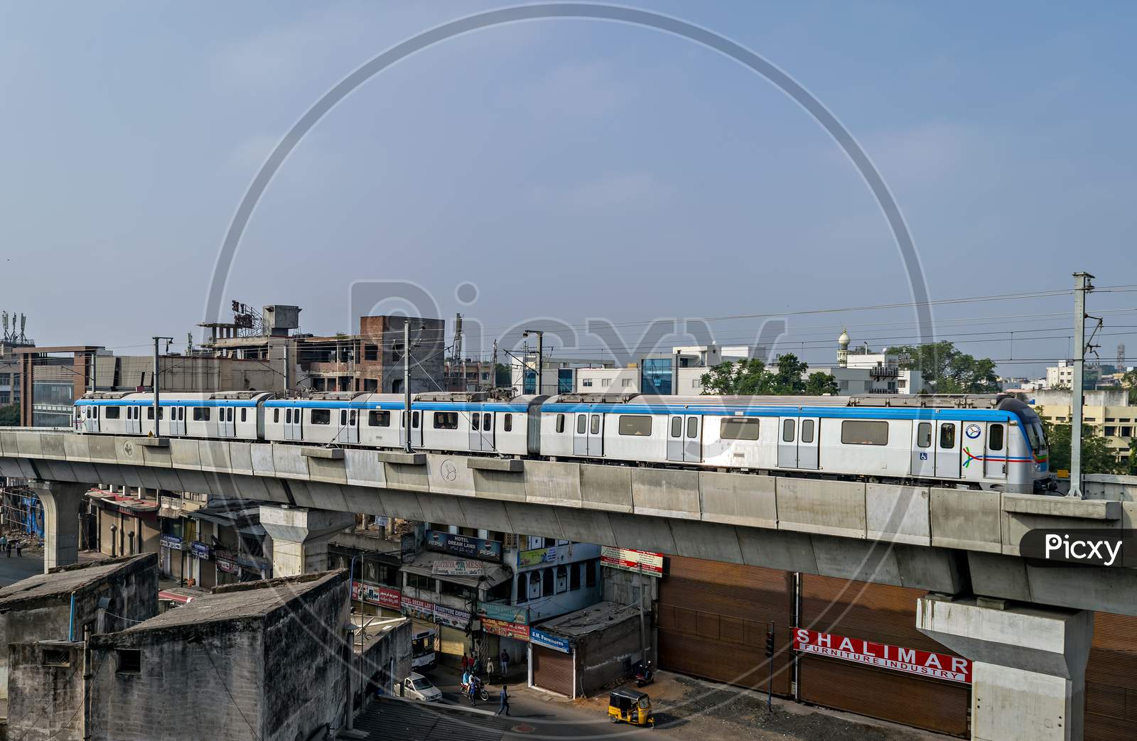Rapid Transit Hyderabad Metro Train Enter Nampally Station In The Morning.