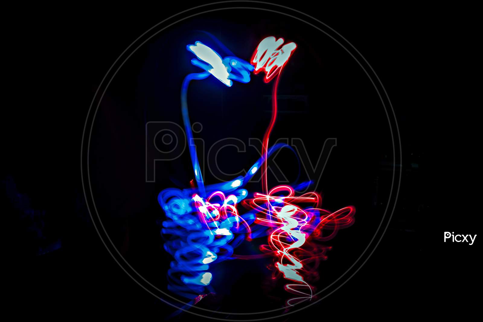 Photograph Of Abstract Light Painting Art Indicating Love.