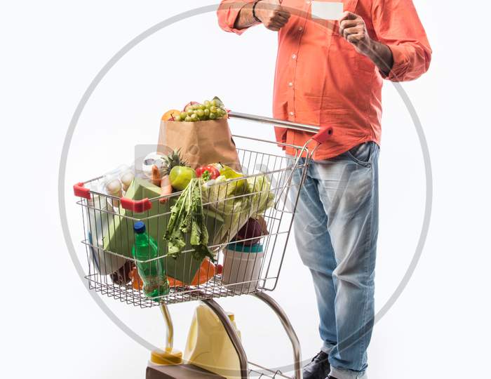 Indian Asian Senior Man With Shopping Trolly Or Cart