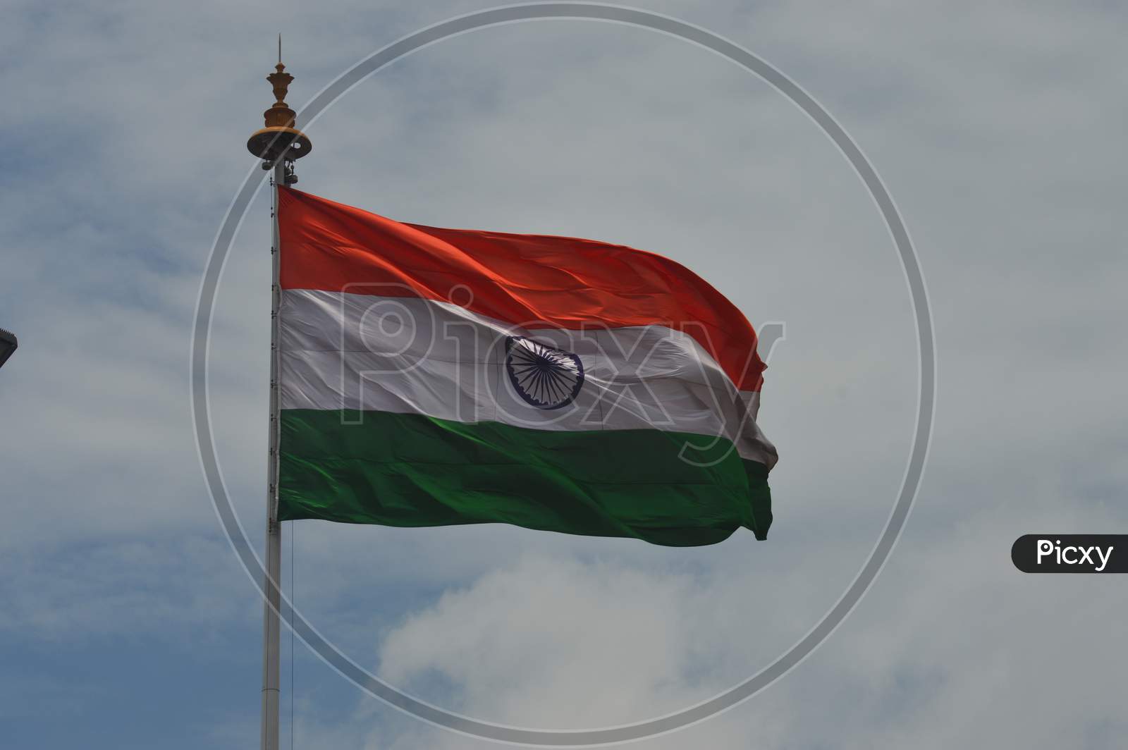 Indian flag to a pole flying in the wind