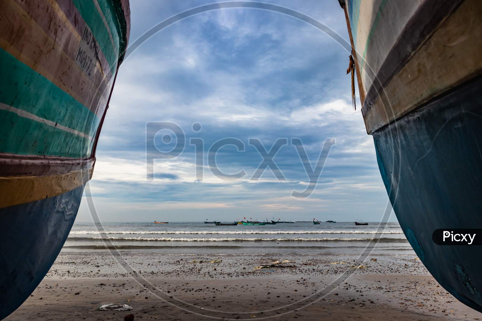 Beach View With Fishing Boats At Early In The Morning From Flat Angle