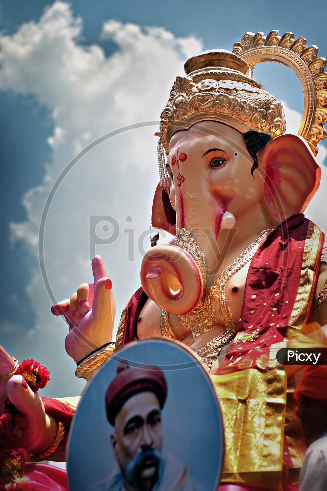 Lord Ganesh photo ,in this photo there is also picture of Lokmanya Tilak who initiated and started Ganesh festival in india
