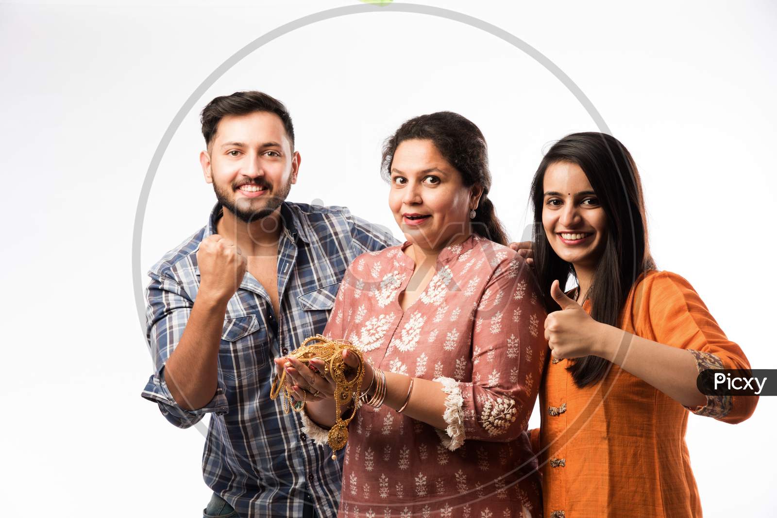 Gold Loan Or Mortgage Concept - Indian Mother With Son And Daughter Holding Gold Jewellery