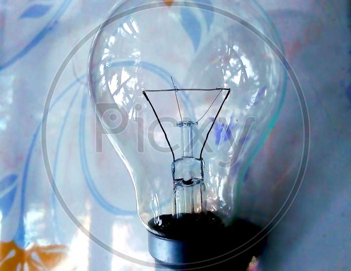 A Transparent Bulb On The Floor