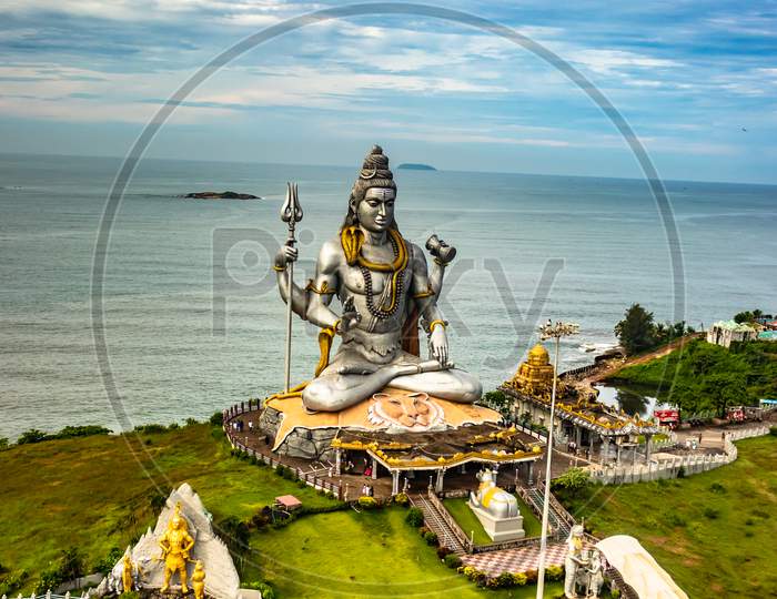 Shiva Statue Isolated At Murdeshwar Temple Aerial Shots With Arabian Sea In The Backdrop