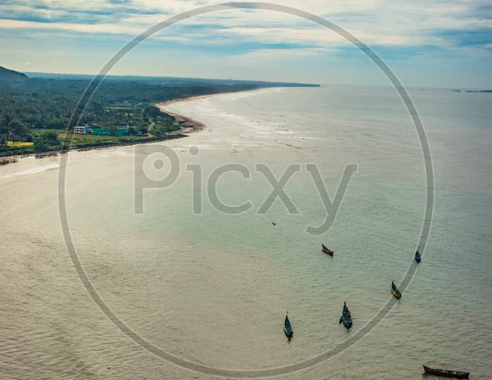 Beach Isolated With Fishing Boats Aerial Shots With Dramatic Sky