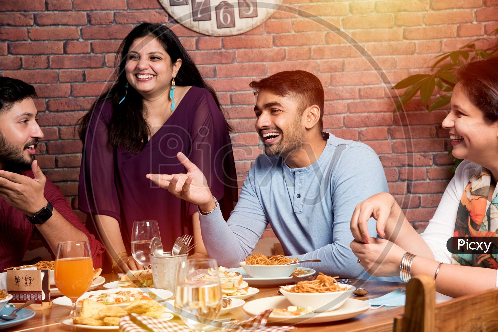 Indian Friends Eating Food In Restaurant - Coffee Shop Celebration Friendship Togetherness Concept