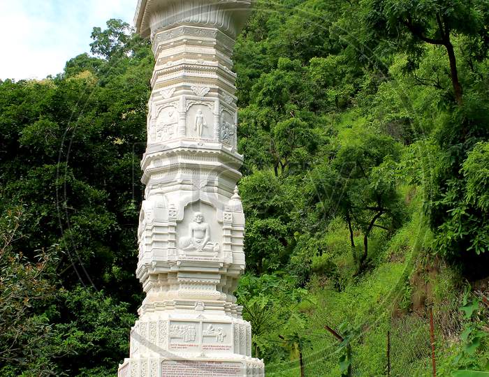 White marble column with carvings