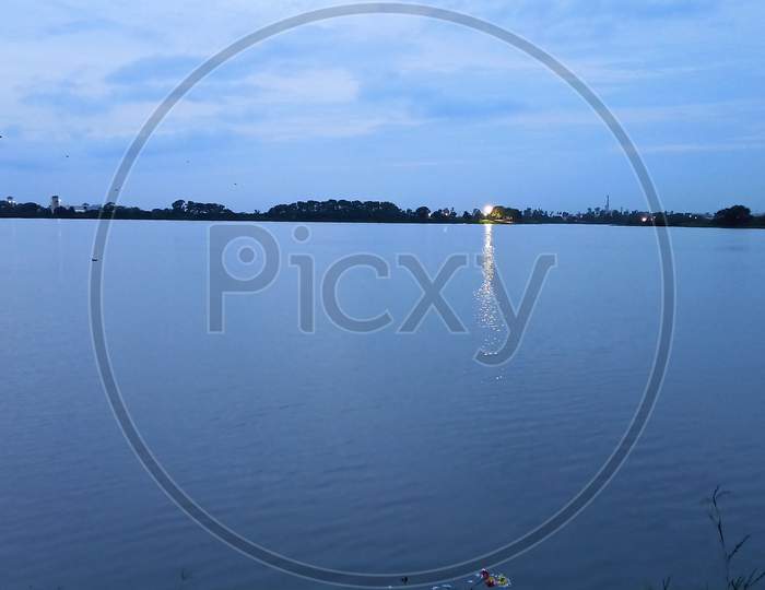 after sunset before night view of lake water