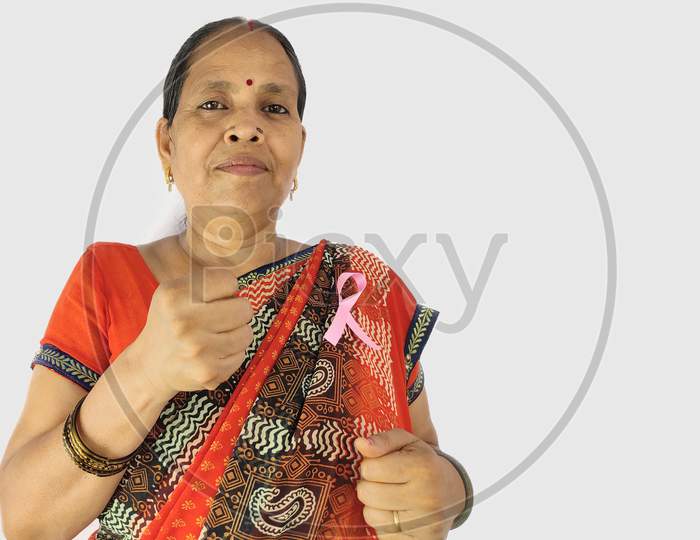 Fight against cancer by woman with pink ribbon