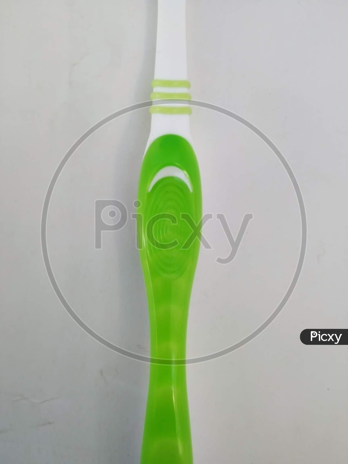 Bangalore, Karnataka/India-Feb 12 2020: Closeup Of New And Unused Green Color Oral-B Plastic Toothbrush Isolated In A White Background