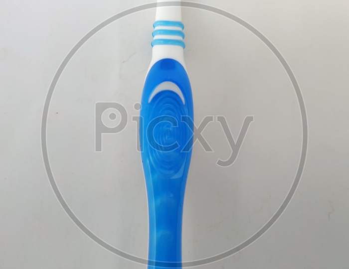 Bangalore, Karnataka/India-Feb 12 2020: Closeup Of New And Unused Blue Color Oral-B Plastic Toothbrush Isolated In A White Background