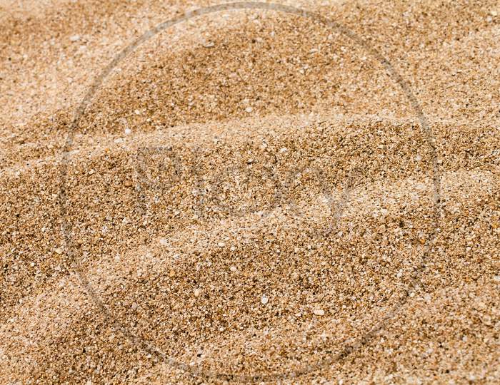Close up of a sand texture with detail grains.