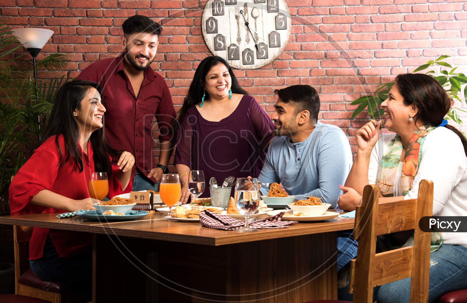 Indian Friends Eating Food In Restaurant - Coffee Shop Celebration Friendship Togetherness Concept