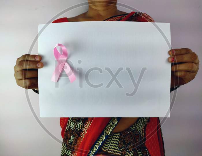Woman holding White paper for message on Breast cancer awareness