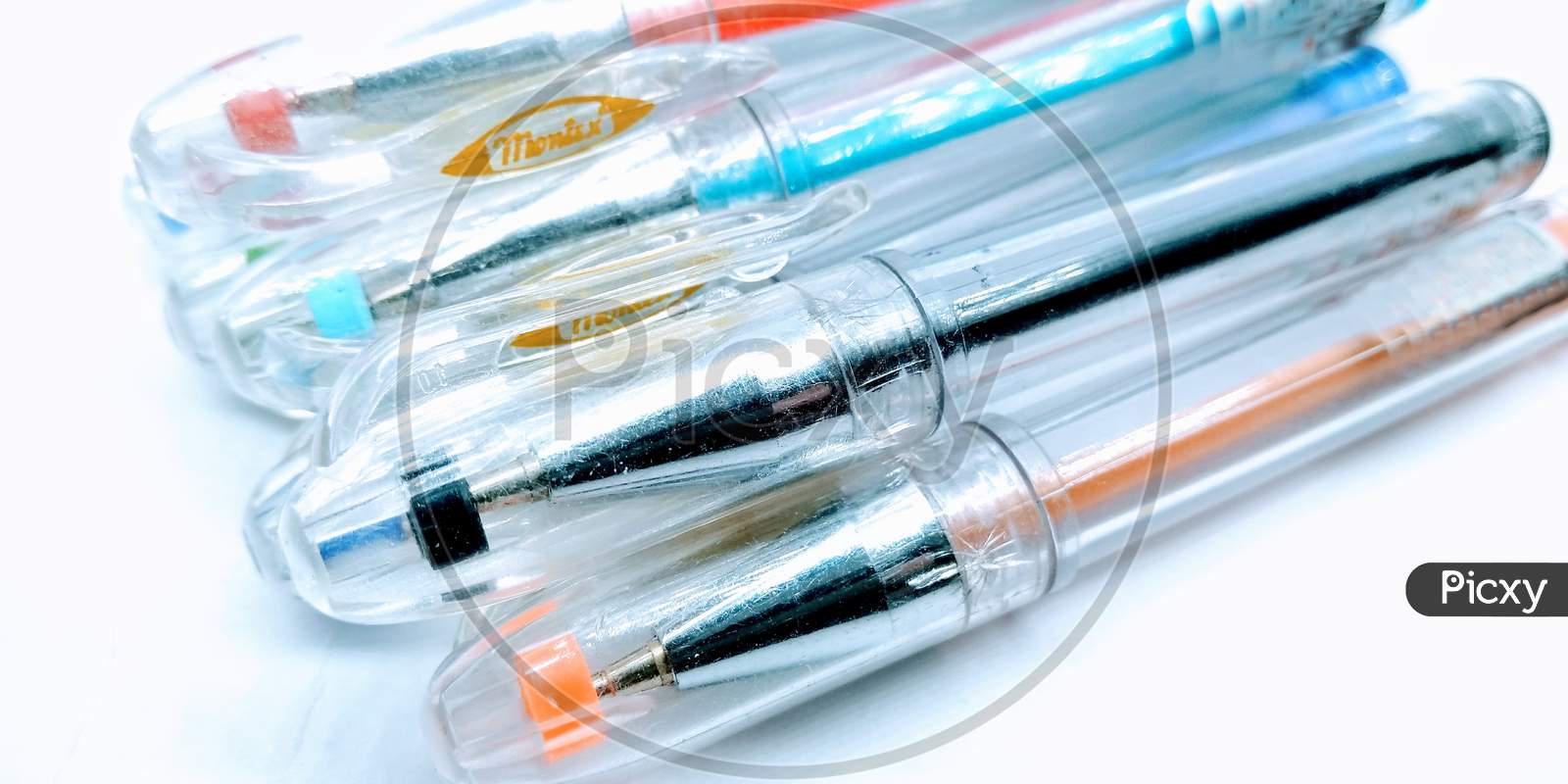 A picture of ink pens on white background