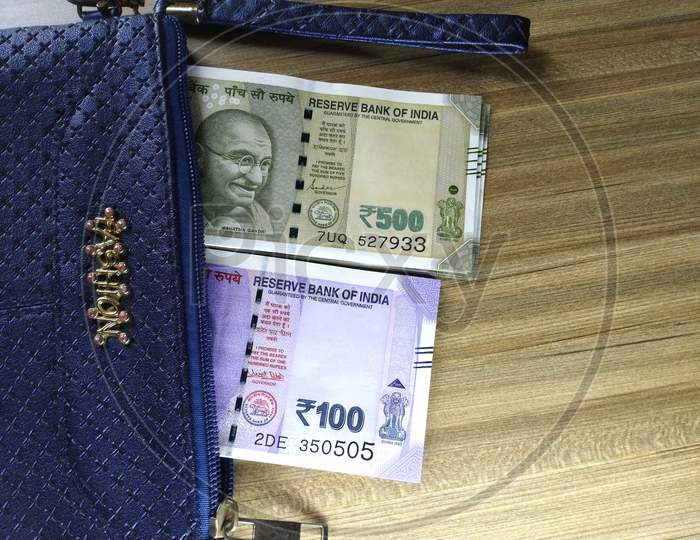 Indian Currency In A Money Purse,100 And 500 Rupee Notes