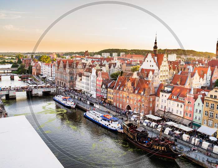 Gdansk, North Poland - August 13, 2020: Panoramic Aerial Shot Of Motlawa River Embankment In Old Town During Sunset In Summer