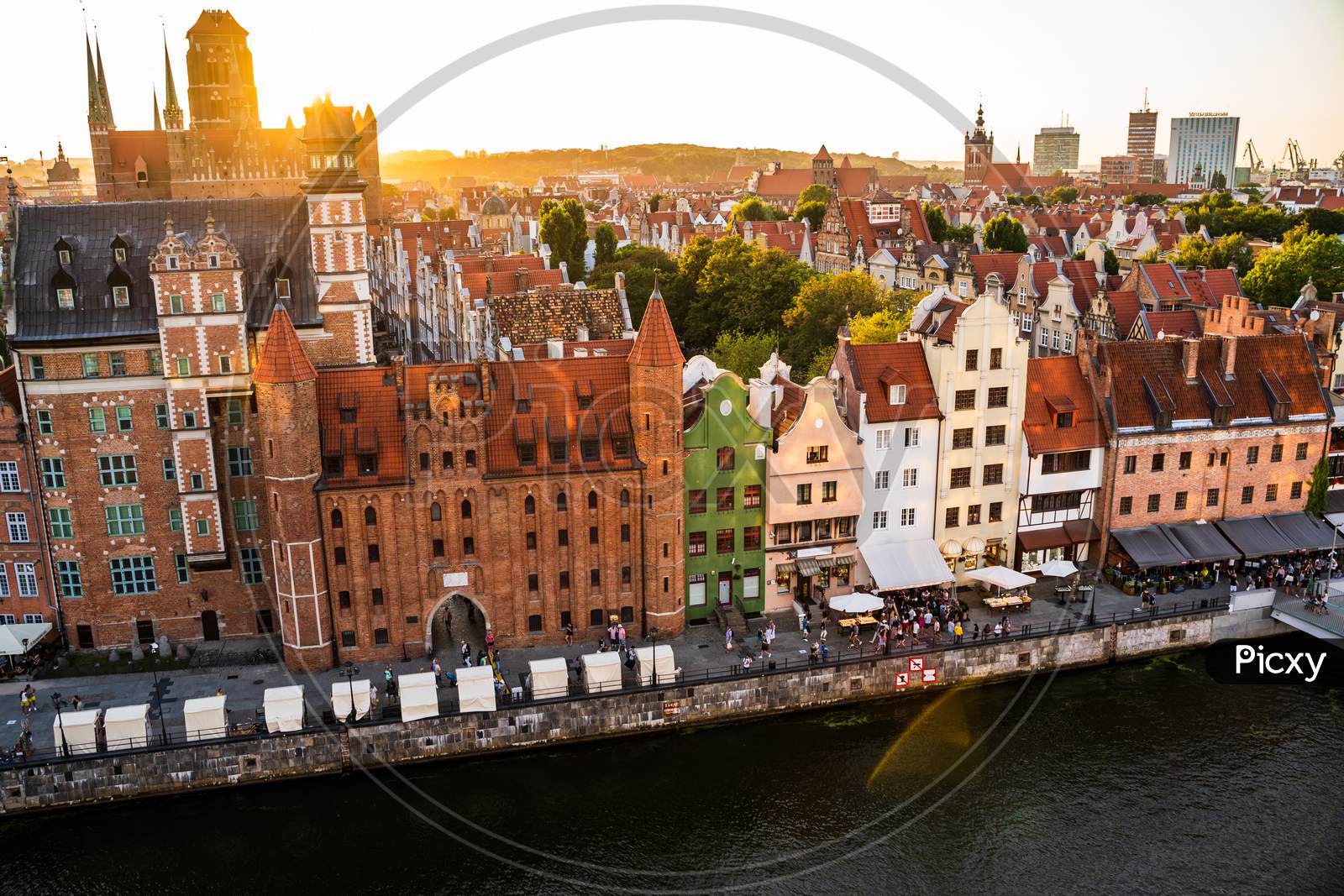 Gdansk, North Poland - August 13, 2020: Gdansk, North Poland - August 13, 2020: Wide Angle Panoramic Aerial Shot Of Motlawa River Embankment In Old Town During Sunset In Summer