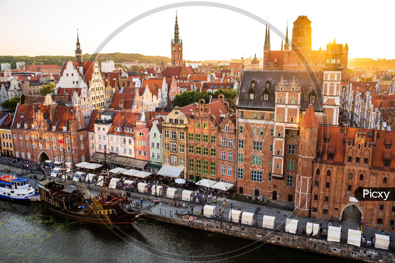 Gdansk, North Poland - August 13, 2020: Wide Angle Panoramic Aerial Shot Of Motlawa River Embankment In Old Town During Sunset In Summer