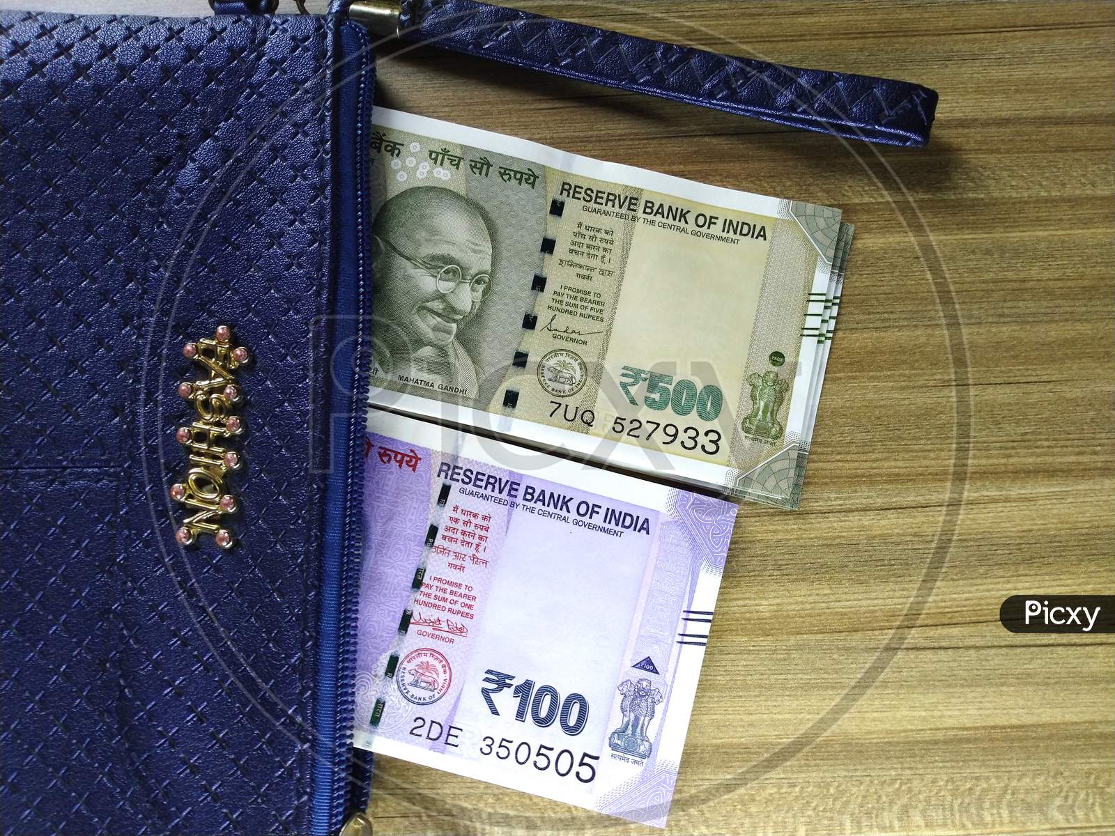 Indian Currency in a Money Purse,100 And 500 Rupee Notes.