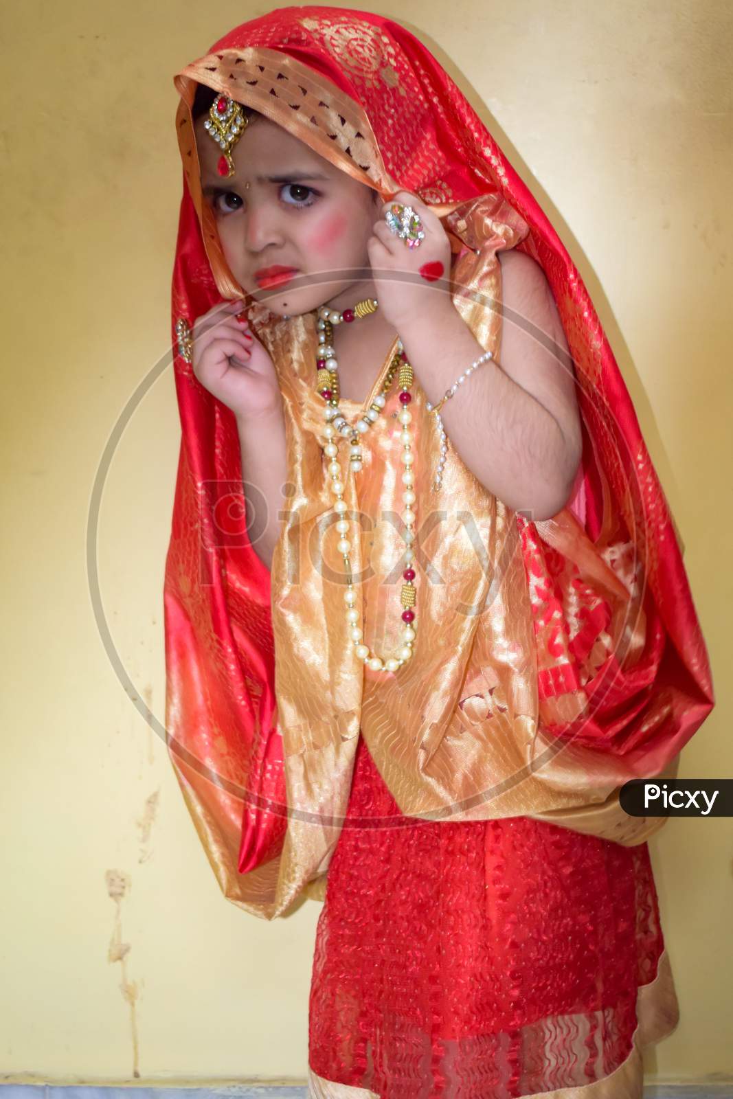 Image of Cute Indian Kid Dressed Up As Little Lord Radha On The ...