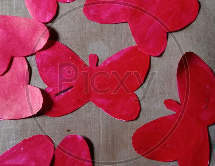 Red colour paper cutting butterfly