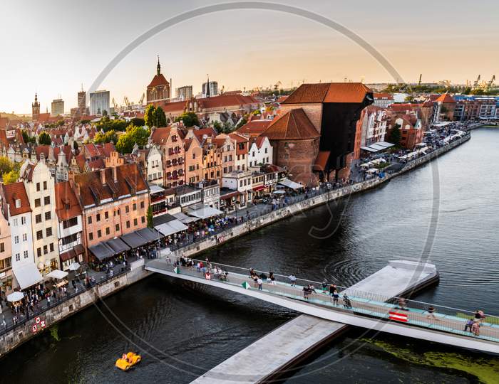 Gdansk, North Poland - August 13, 2020: Wide Angle Aerial Shot Of Motlawa River Embankment In Old Town During Sunset In Summer