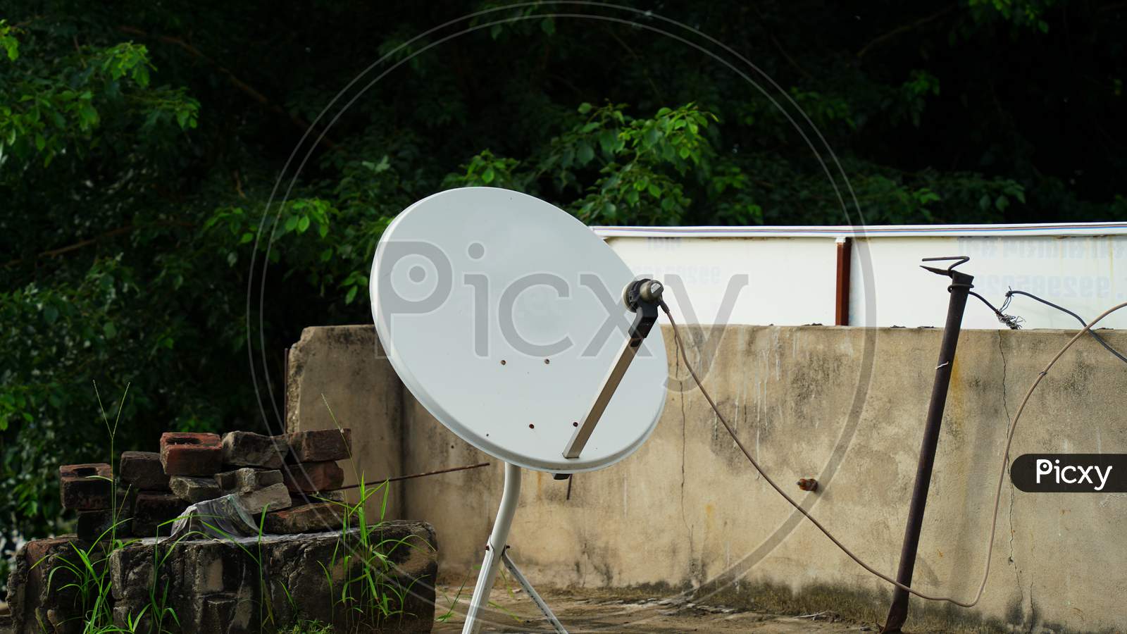 Small satellite dish for Television communication and digital service. Direct to home or DTH service satellite antenna.