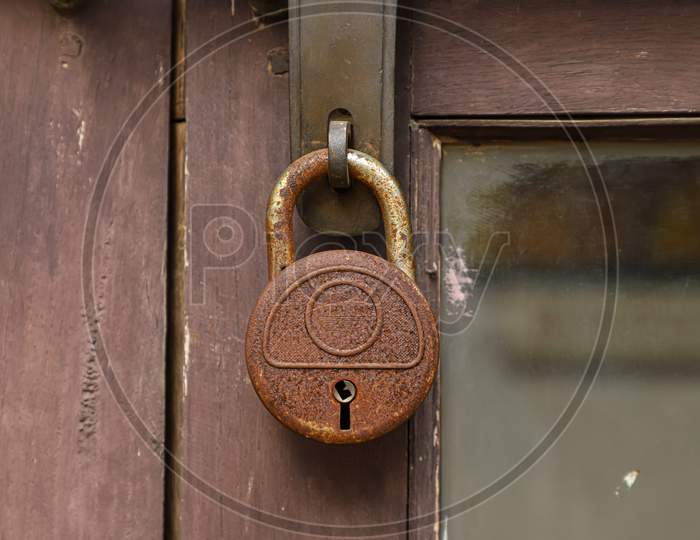 closed wooden door with lock