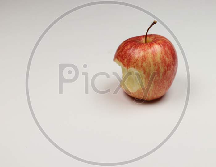 A Bitten Apple Fruit isolated on white background